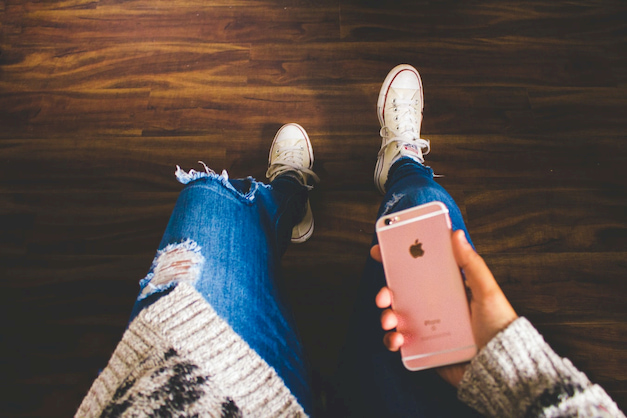 woman sitting with here shoes on