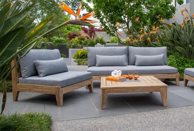 grey and wood lounge setting in the garden